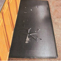 wear-through and delamination of a two-piece construction mat