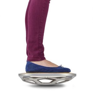 Woman stands on Fluidstance Level balance board