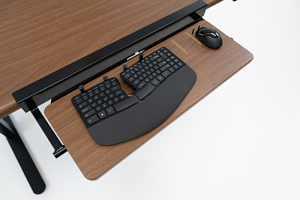 A keyboard tray increases standing desk health benefits